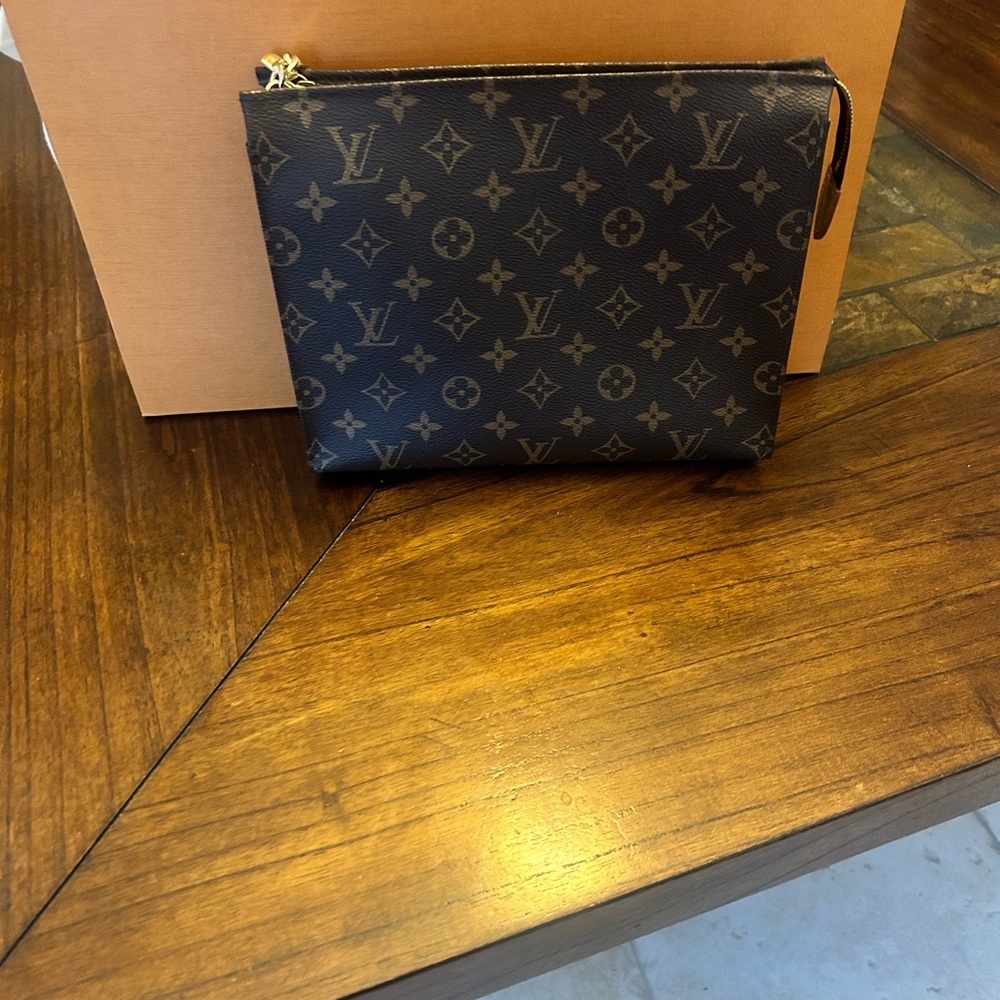 NWT Louis Vuitton Toiletry 26 pouch. Comes with the Louis Vuitton box